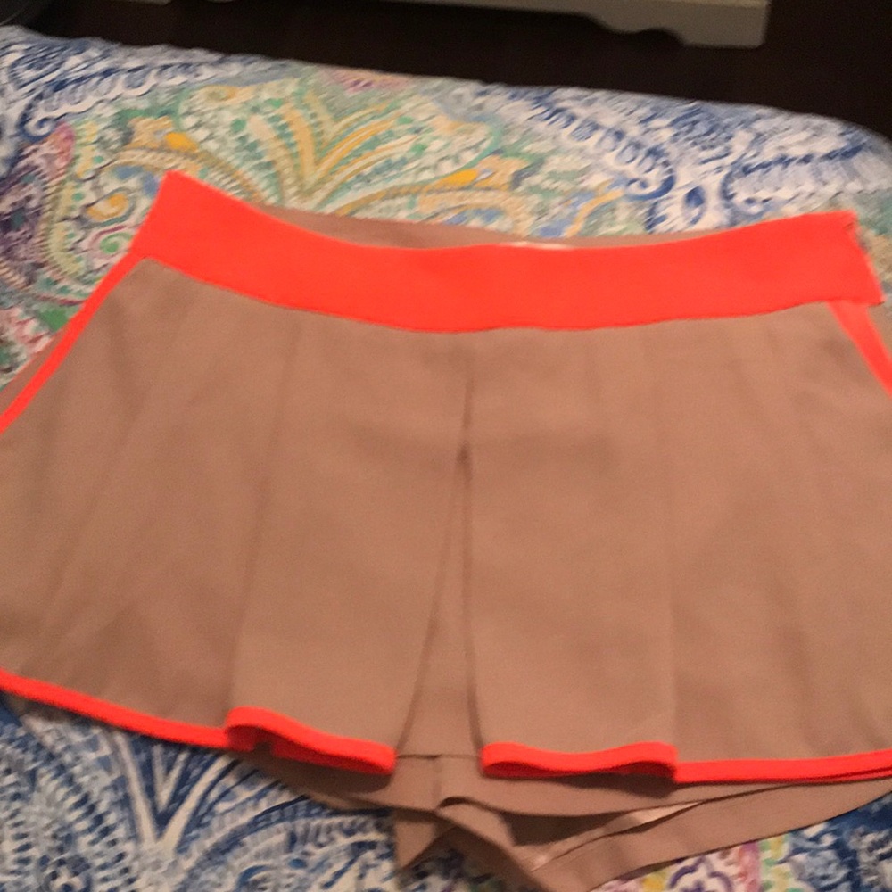 Faux skirt shorts with neon trim